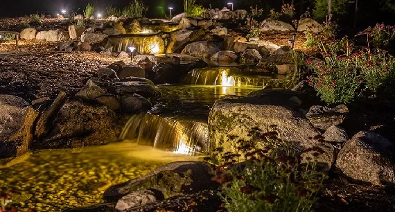 Waterfall with outdoor lighting