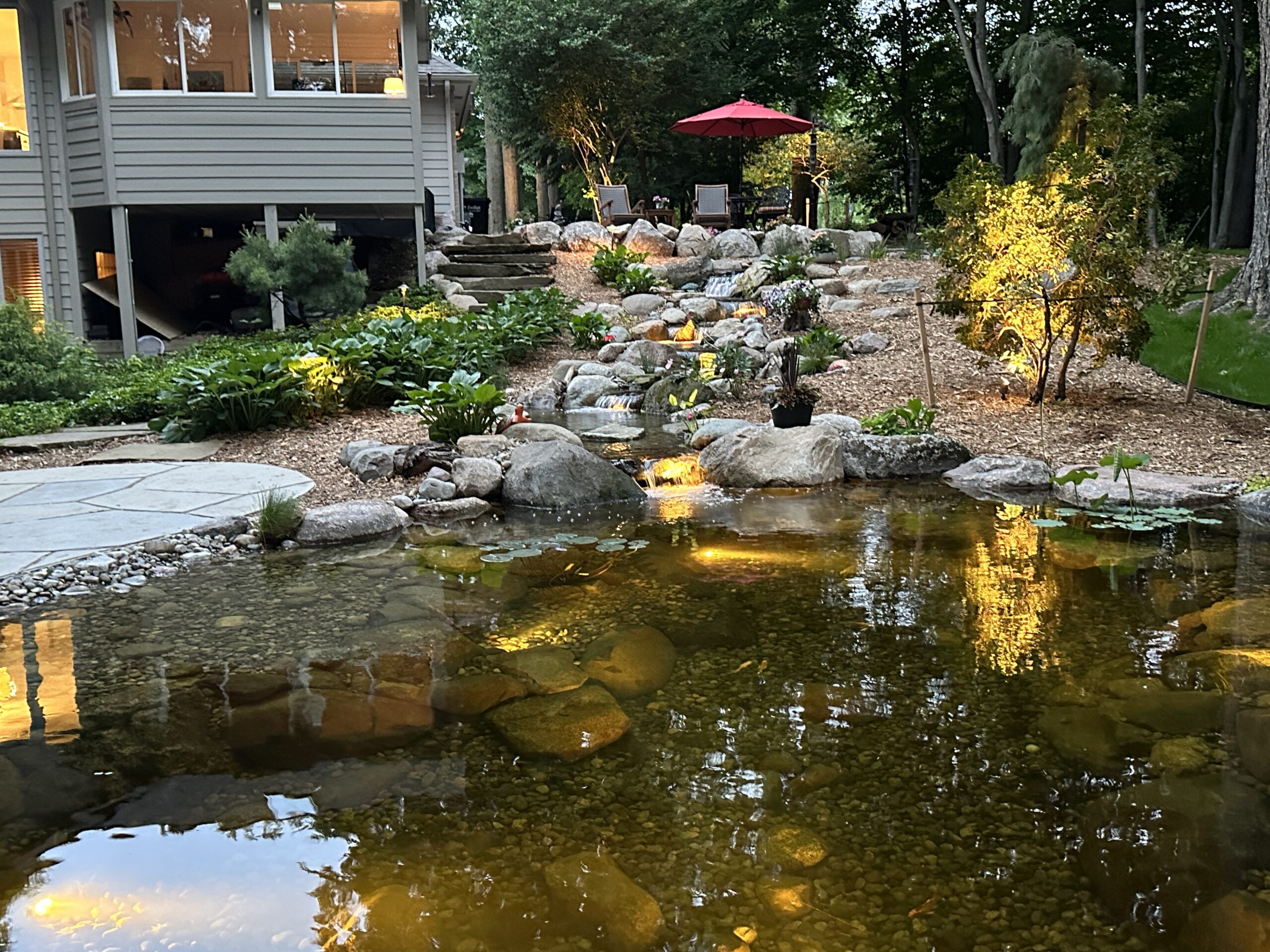 ecosystem koi pond, waterfalls, wetland filter, aquatic lighting, flagstone patio, flagstone walkway, outdoor lighting